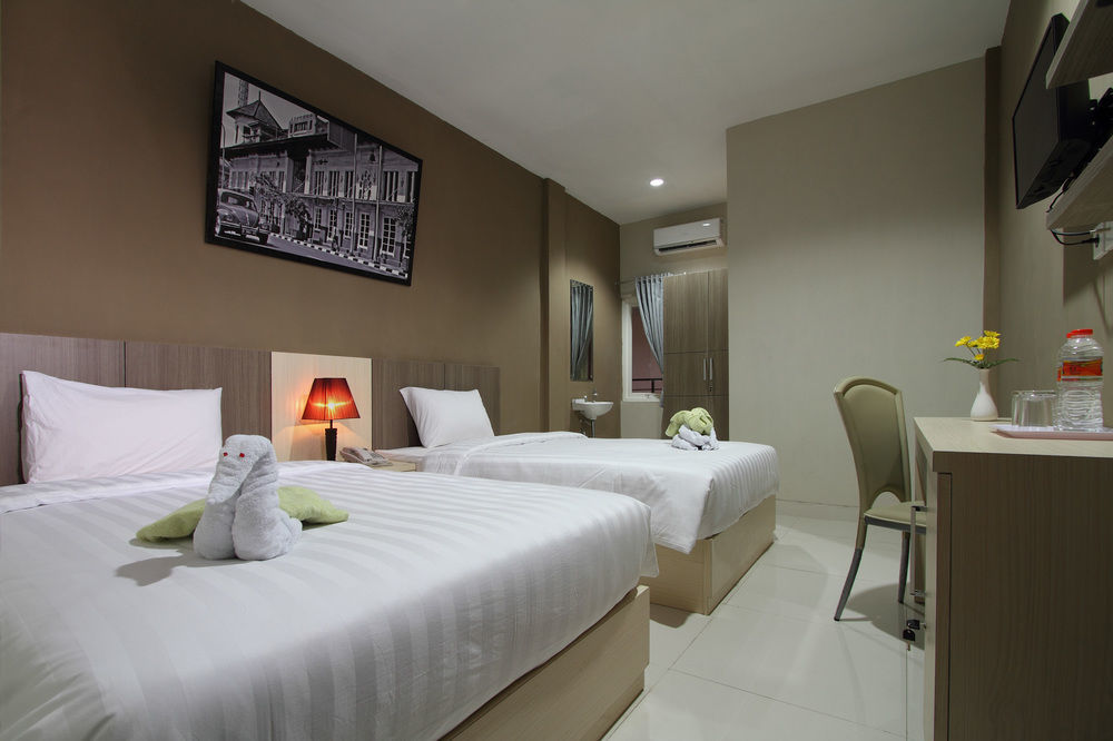 Oyo Flagship 3726 Tembok Batu Residence Tugu Zewnętrze zdjęcie